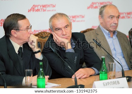 MOSCOW - DEC 2: Popular actors give interview about film Master and Margarita sitting at table in press private residence Arguments and Facts on December 2, 2010 in Moscow, Russia.