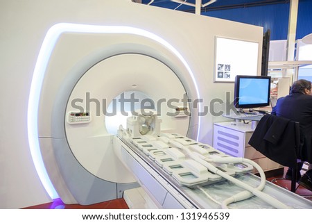 Representative sits on the exhibition of medical equipment