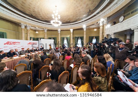 MOSCOW - DECEMBER 2: Popular actors give interview about film Master and Margarita sitting at table in press private residence Arguments and Facts on December 2, 2010 in Moscow, Russia.