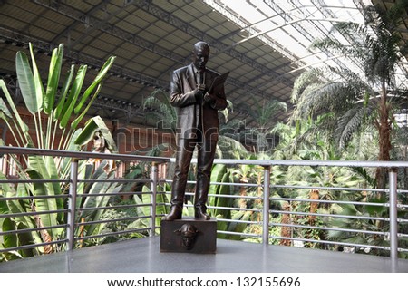 MADRID - MARCH 8: Monument to commercial agent Atocha railway station on March 8, 2012 in Madrid, Spain. Sculptor Francisco Lopez Hernandez. Opened in 1998.