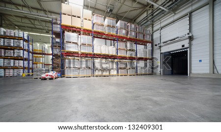 MOSCOW - JUNE 5: Big warehouse with shelves at Caparol factory on June 5, 2012 in Moscow, Russia. Caparol company has existed for 115 years.