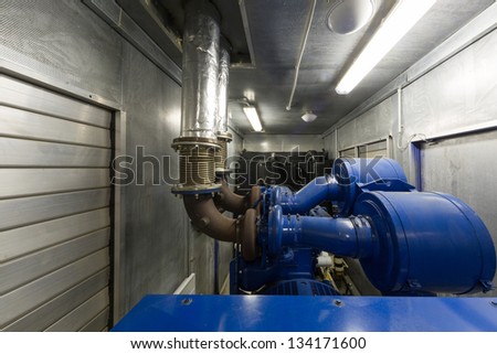 Diesel generator for backup power in control room.
