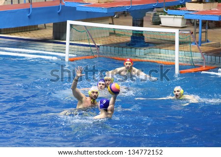 MOSCOW - APR 20: Game in front of goal in match on water polo of Olympic Sports complex, on April 20, 2012 in Moscow, Russia