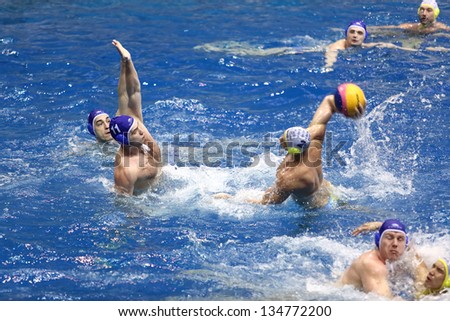 MOSCOW - APR 20: Battle in match on water polo of Olympic Sports complex, on April 20, 2012 in Moscow, Russia