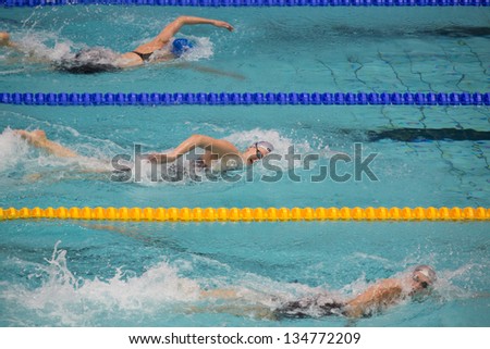 MOSCOW - APR 20: Athletes women swim in Olympic Sports complex on Championship of Russia on swimming, on April 20, 2012 in Moscow, Russia