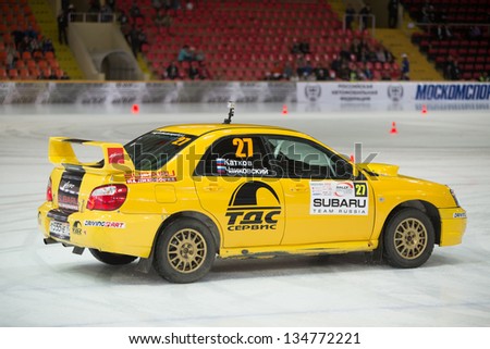 MOSCOW - APR 21: Katkov and Tchaikovsky in racing car on ice in sports complex Krylatsky, on Rally Masters Show, on April 21, 2012 in Moscow, Russia