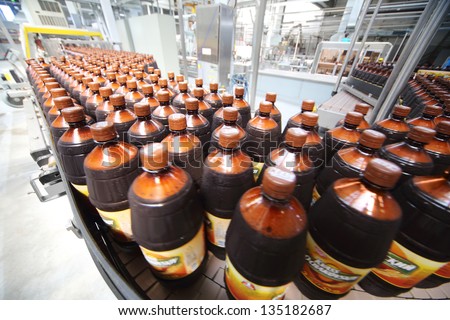 MOSCOW - MAY 16: Many beer bottles in Ochakovo factory, on May 16, 2012 in Moscow, Russia. Ochakovo was founded in 1978.