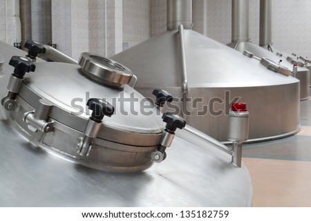 MOSCOW - MAY 31: Big metal cisterns for beer in Ochakovo factory, on May 31, 2012 in Moscow, Russia. Ochakovo company has 18 enterprises.