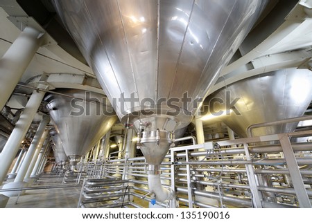 MOSCOW - MAY 31: Complex construction of cisterns and pipes in Ochakovo factory, May 31, 2012, Moscow, Russia. Ochakovo aims to produce natural, without preservatives, artificial additives products.