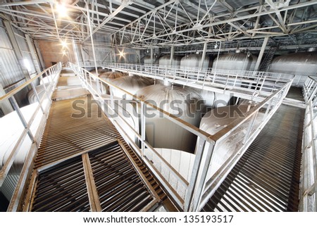 MOSCOW - MAY 31: Many metal cisterns in Ochakovo factory, on May 31, 2012 in Moscow, Russia. Moscow Ochakovo brewery produces 750 million liters of beer every year.