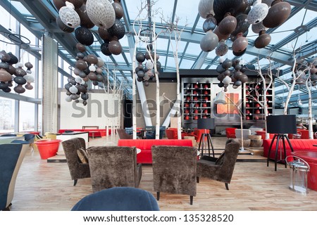 MOSCOW -  AUG 8: Modern design of restaurant Sixty in gray, red, brown and white colors on August 8, 2011 in Moscow, Russia.
