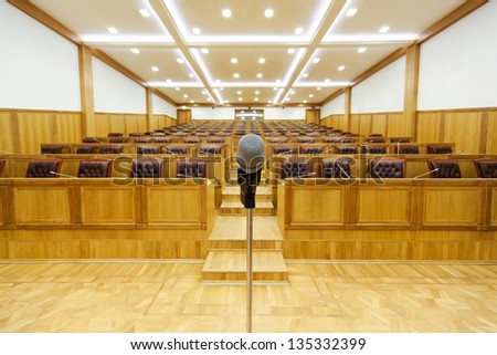 Governmental conference room. Microphone in the center of area