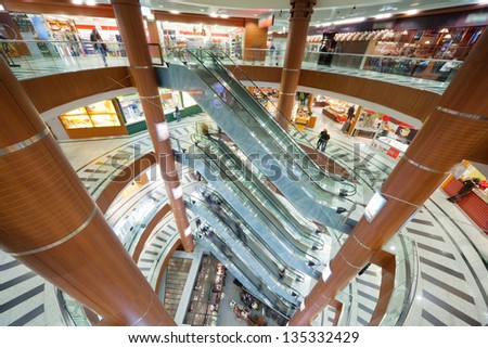 MOSCOW - OCT 31: Escalator and floors in shopping mall Schuka, Oct 31, 2011 in Moscow, Russia. Schuka was opened, June 2, 2007, contains 8 floors, total area of shopping center 105,000 square meters