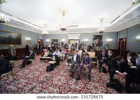 MOSCOW - APRIL 24: Newspapermans sit on Enlarged meeting of Council in Grand Kremlin Palace on April 24, 2012 in Moscow, Russia.