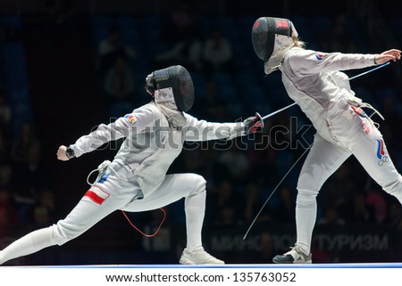 MOSCOW - APR 6: Women compete on championship of world in fencing among juniors and cadets, in Sports Olympic complex, on April 6, 2012 in Moscow, Russia