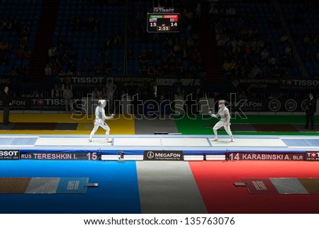 MOSCOW - APR 6: Tereshkin and Karabinski compete  on championship of world in fencing among juniors and cadets, in Sports Olympic complex, on April 6, 2012 in Moscow, Russia