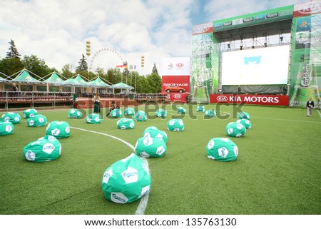 MOSCOW - JUN 8: Girls make foto in fanzone before match in All-Russian Exhibition Center on UEFA EURO 2012, on Jun 8, 2012 in Moscow, Russia