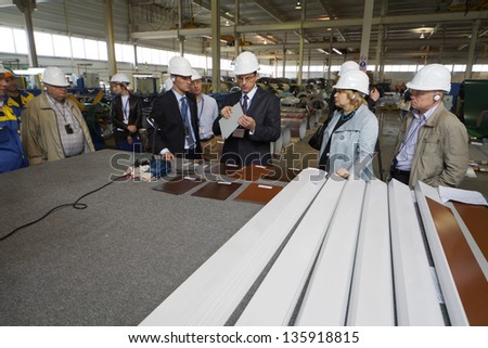 LOBNYA - JUN 7: Managers of company and journalists and editors of specialized editions during open press tour at plant of Group of companies Metal Profile, June 7, 2012, Lobnya, Russia.