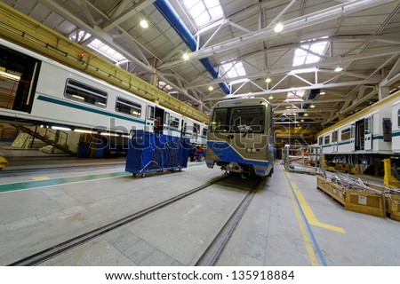MYTISHCHI - APR 18: Coaches in assembling shop floor at  Mytishchi Metrovagonmash factory, April 18, 2012, Mytishchi, Russia. The plant is famous for creating user-friendly subway cars.