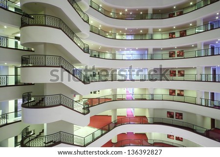 ALANYA - JULY 5: Spiral staircase and balconies inside Goldcity hotel, on July 5, 2012 in Alanya, Turkey. Main building of hotel GoldCity is 16-storey.