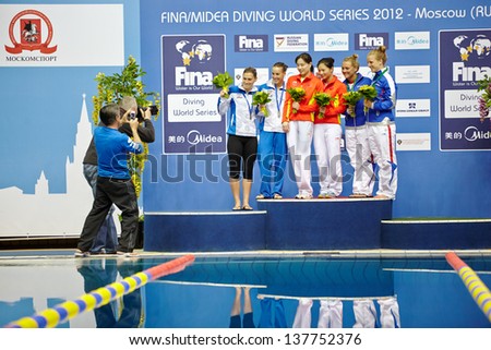 MOSCOW - APR 13:  Female athletes-medalists are pfotographed on victory podium at Pool of SC Olympic on day of third phase of the World Series of FINA Diving, April 13, 2012, Moscow, Russia.