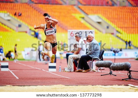 MOSCOW - JUN 11: Female jumper in long jump place at Grand Sports Arena of Luzhniki OC during International athletics competitions IAAF World Challenge Moscow Challenge, June 11, 2012, Moscow, Russia.