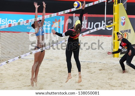 MOSCOW - JUNE 6: Female athletes from Brazil play volleyball in Country Quota at tournament Grand Slam of beach volleyball 2012, on June 6, 2012 in Moscow, Russia.