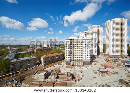 MOSCOW - APR 30: Buildings under construction of residential compound Elk Island, April 30, 2012, Moscow, Russia. This is 12-29 storey buildings with living area of 100 000 square meters.