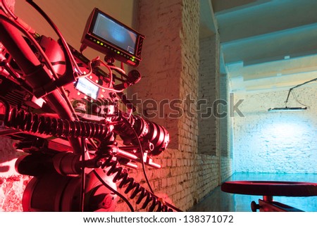 MOSCOW - OCT 24: A red light camera in the studio for shooting video clip Rene in White Studio, on October 24, 2010 in Moscow, Russia.