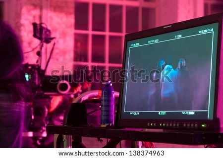 Moscow - Oct 24: Workers Prepare The Stage With Three Men On Shooting Video Clip Rene In White Studio, On October 24, 2010 In Moscow, Russia.
