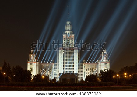 MOSCOW -  AUG 28: Evening view of the Moscow State University with a large number of projectors on August 28, 2011 in Moscow Russia. With the spire height - 240 m