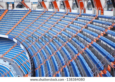 MADRID - MAR 8: Blue grandstand in Santiago Bernabeu Stadium - arena of soccer club Real Madrid, Mar 8 2012 Madrid, Spain. Spanish football club Real Madrid named FIFA best football club in XX century