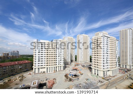 MOSCOW - AUGUST 6: Modern residential complex Elk Island under construction, on August 6, 2012 in Moscow, Russia. Residential complex Elk Island has total area of apartments is 100 000 square meters.