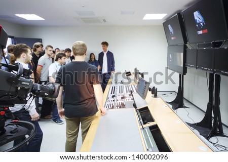 MOSCOW - AUGUST 15: Young producer Ilya Bachurin in room for mounting films in new cinema complex Glavkino, on August 15, 2012 in Moscow, Russia.
