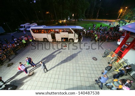 MOSCOW - AUG 15: Fans are watching as players get on bus after match between Russia national team and Ivory Coast at Lokomotiv Stadium, Aug 15, 2012, Moscow, Russia. The game ended with the score 1:1