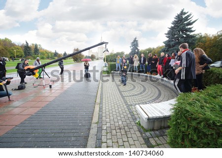 MOSCOW - OCTOBER 11: Shooting clip of The one band in front of Moscow State University, on October 11, 2012 in Moscow, Russia.