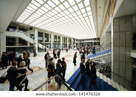 MOSCOW - OCTOBER 14: People in lobby and on staircase after anniversary concert of Edyta Piecha in Kremlin Palace, on October 14, 2012 in Moscow, Russia.