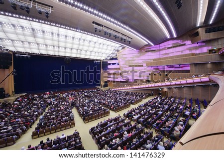 MOSCOW - OCTOBER 14: Spectators in break of concert Edyta Piecha at Kremlin Palace, on October 14, 2012 in Moscow, Russia. 6000 people came to concert of Edita Piecha.