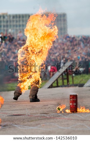 MOSCOW - AUG 25: Man on fire stunt shows on Festival of art and film stunt Prometheus in Tushino on August 25, 2012 in Moscow, Russia. The festival was organized in 1998.