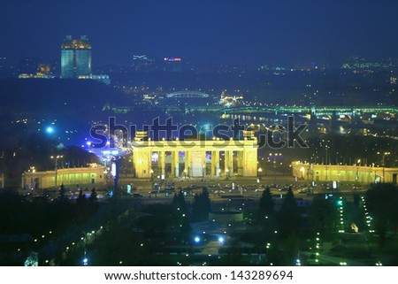 MOSCOW - NOV 21: The gate in the form of a triumphal arch of Gorky Park at night, on Nov 21, 2012 in Moscow, Russia. It is the central Moscow park, located in the heart of the city.