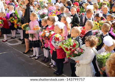 Moscow - Sep 1: Children With Flowers In Front Of The School No. 1349 On The First Day Of School On September 1, 2012 In Moscow, Russia.