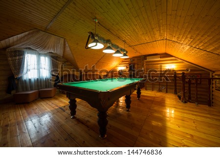 MOSCOW - JAN 1:  The cozy interior of a country house with a billiard table in Elite Complex Manor Bath at Elk Island on January 1, 2013 in Moscow, Russia.