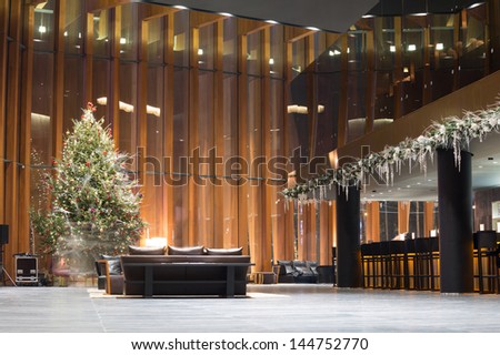 MOSCOW - DEC 29: Relaxation area with a sofa and fir-tree in Barvikha Concert Hall on December 29, 2012 in Moscow, Russia.