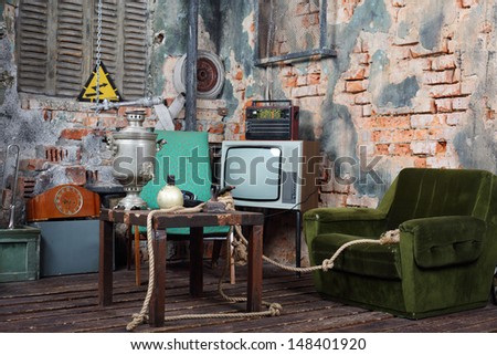 Old Armchair, Television, Radio And Table With Samovar In Very Old House.