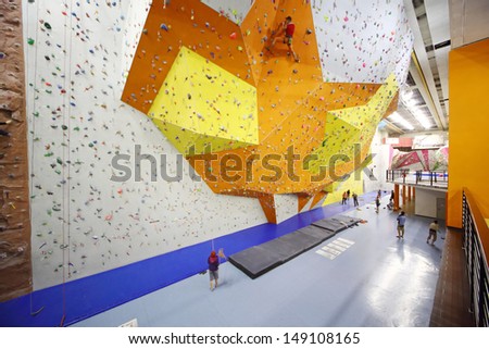 MOSCOW - DEC 5: Several people involved in climbing in a climbing gym Bigwall on Savelovskaya on December 5, 2012 in Moscow, Russia.