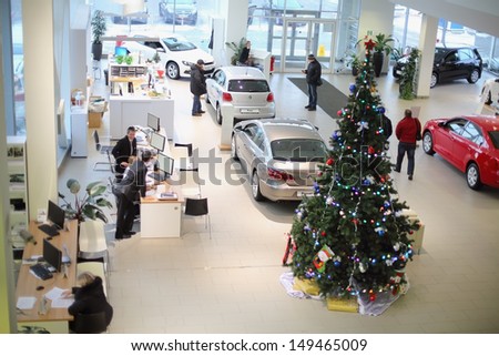 MOSCOW - JAN 11: Top view of the foyer with a reception and cars of Volkswagen Center Varshavka January 11, 2013, Moscow, Russia. Building of the center contains a three floor