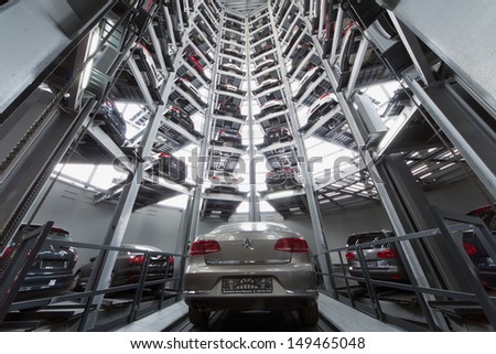 MOSCOW - JAN 11: Volkswagen Passat in the center of the tower to store cars in Volkswagen Center Varshavka on January 11, Moscow, Russia. Tower was designed and built in 2009