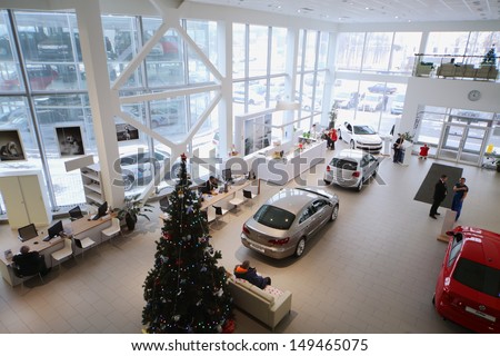 MOSCOW - JAN 11: Top view of the foyer with a reception and cars of Volkswagen Varshavka Center January 11, 2013, Moscow, Russia. Building of the Center contains a three floor