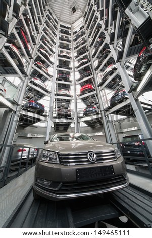 MOSCOW - JAN 11: Bottom view in the tower to store cars in Volkswagen Center Varshavka with a Volkswagen Passat in the center on January 11, Moscow, Russia