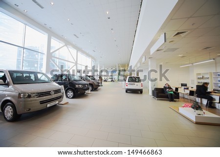 Moscow - Jan 11: The Official Dealer Volkswagen - Center Varshavka, Hall With A Range Of Cars On January 11, 2013, Moscow, Russia. Volkswagen Dealership Offers A Full Range Of Cars Volkswagen